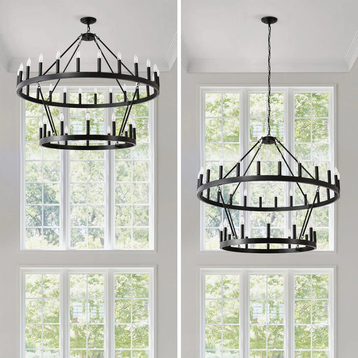 Farmhouse wagon wheel chandelier with black metal frame in a bright room with large windows