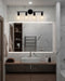 Black four-lamp LED vanity light with clear glass