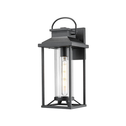 Black outdoor wall lantern with clear glass on a white background