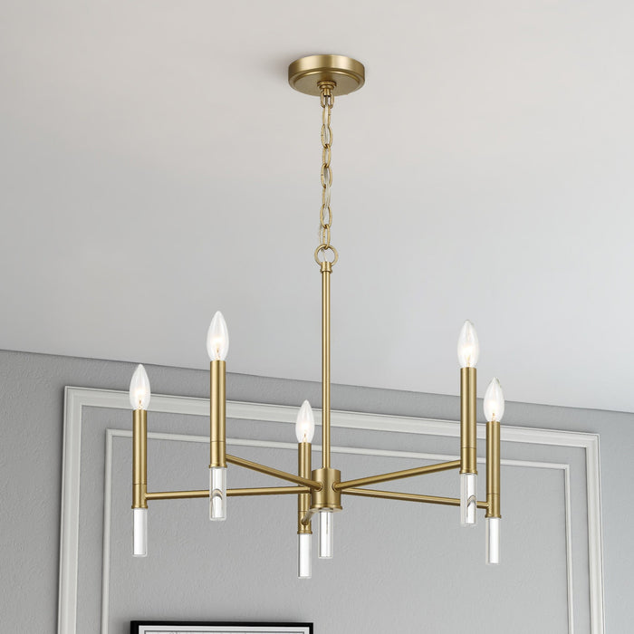 Gold chandelier with multiple lights in a room setting
