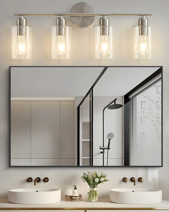 Transitional brushed nickel vanity light with rounded shades