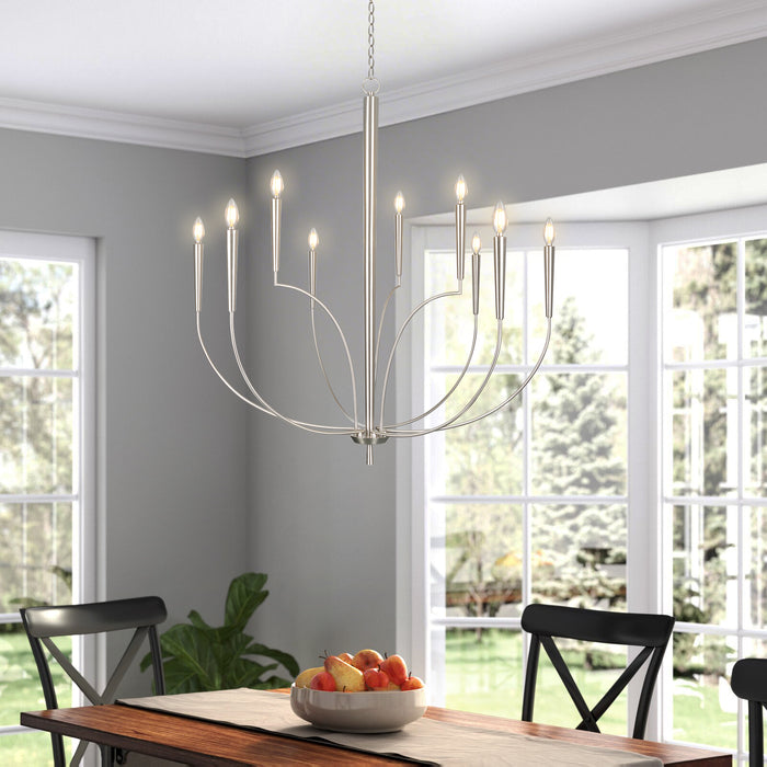 Chandelier hanging above a dining table