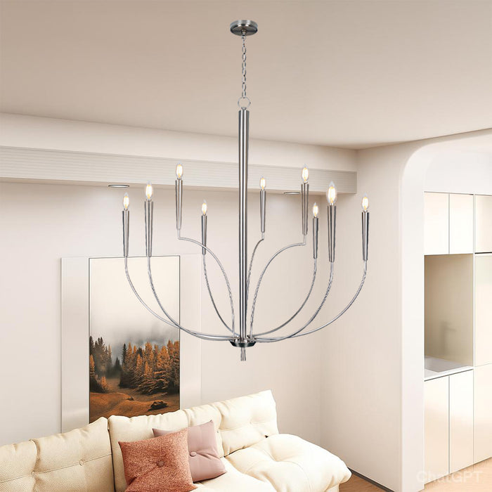 Modern chandelier hanging above a sofa in a living room setting.