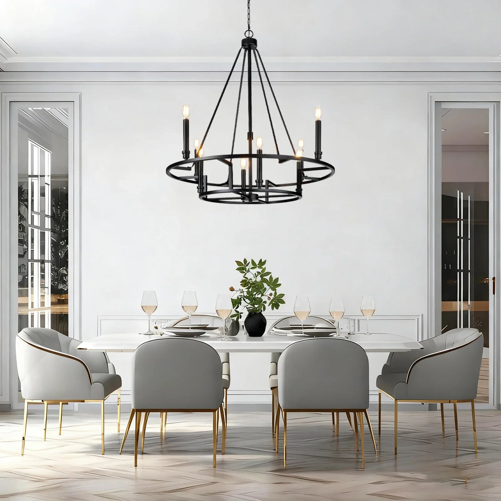 Modern dining room with a black chandelier, white table, and gray chairs.