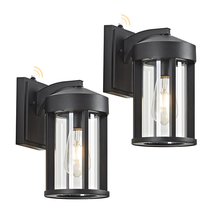 Two black outdoor wall lights with clear glass shades on a white background